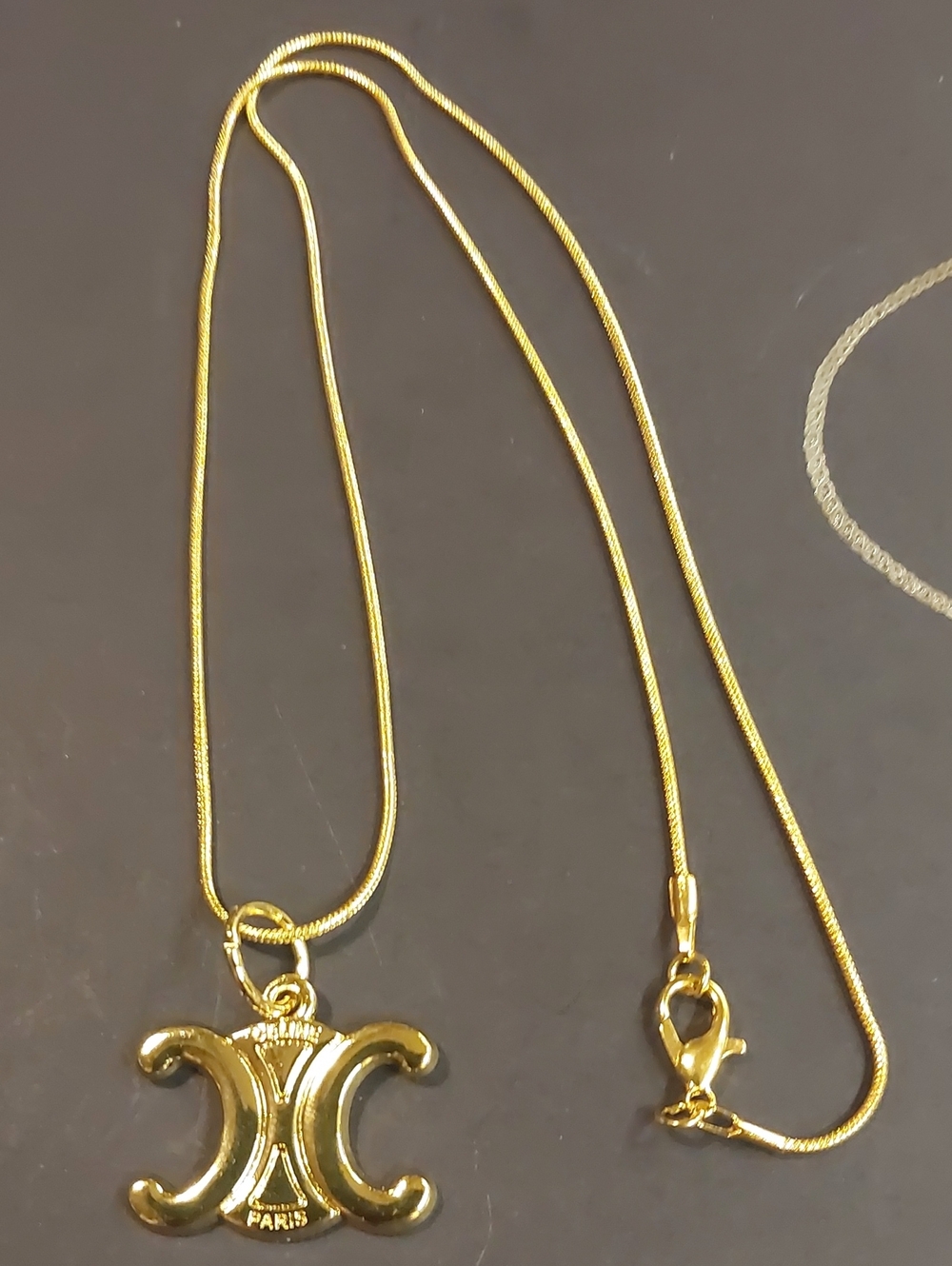 Paris Gold-Tone Crescent Pendant Necklace - Elegant Women's Jewelry